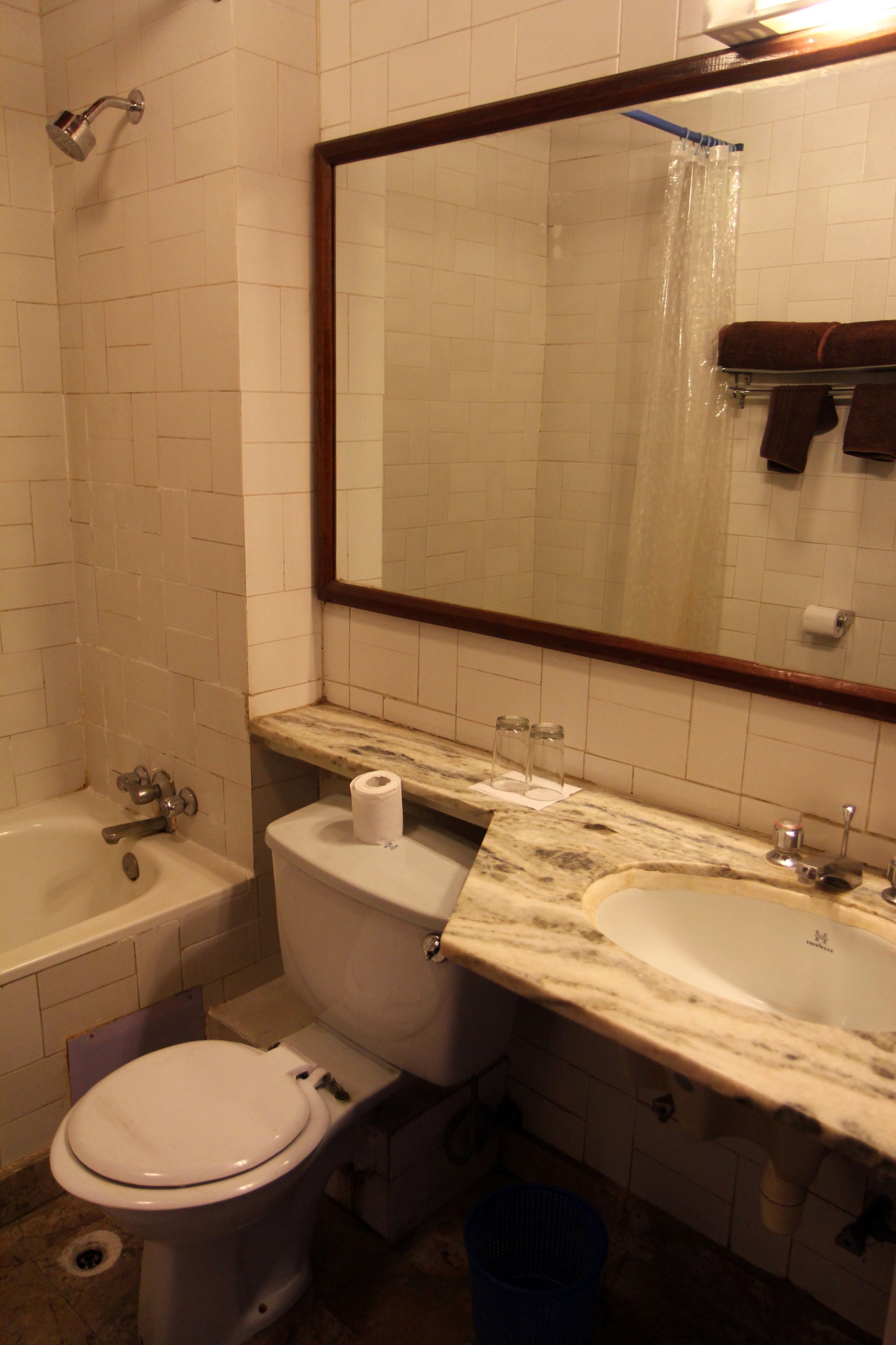 deluxe room, 2 queen beds | bathroom | hair dryer, towels