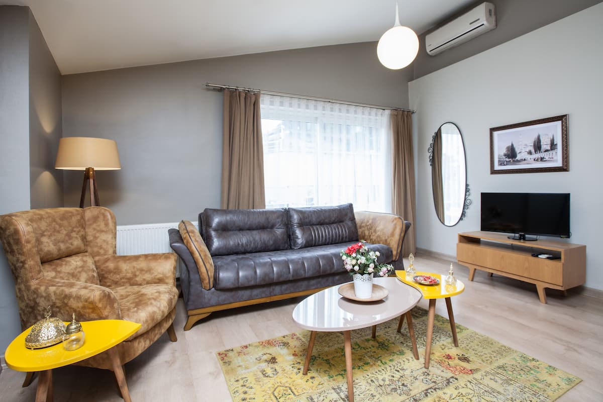 Exclusive Suite, Terrace | Living area | TV