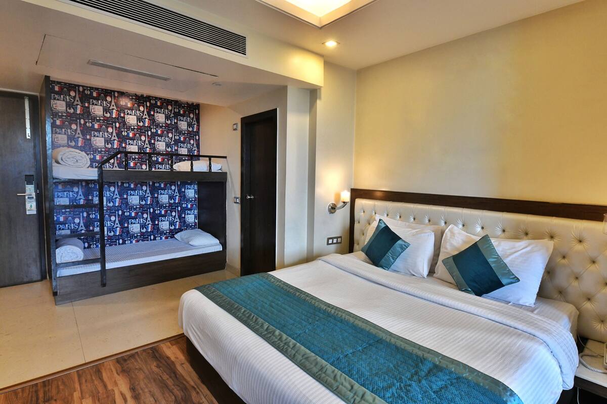 Suite junior | Ropa de cama de alta calidad y minibar