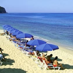 On the beach, sun-loungers, beach umbrellas