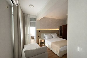 Standard Quadruple Room, 2 Bedrooms, Accessible, City View | Minibar, blackout drapes, soundproofing, free wired internet