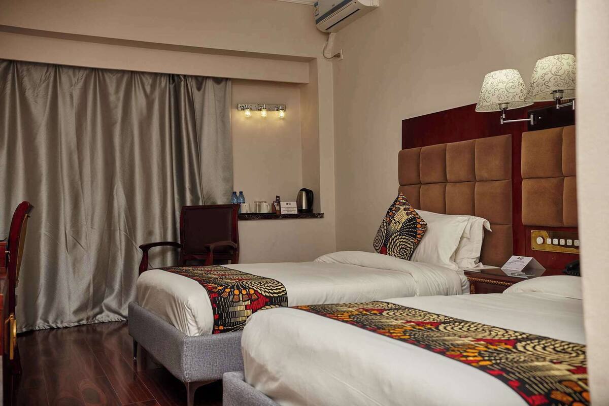 Premium bedding, down duvets, Select Comfort beds, minibar