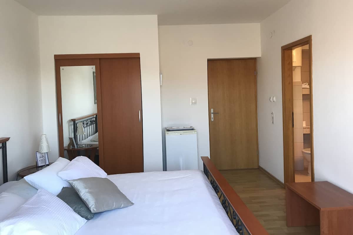 King Room with Balcony | 1 bedroom, premium bedding, minibar, individually decorated