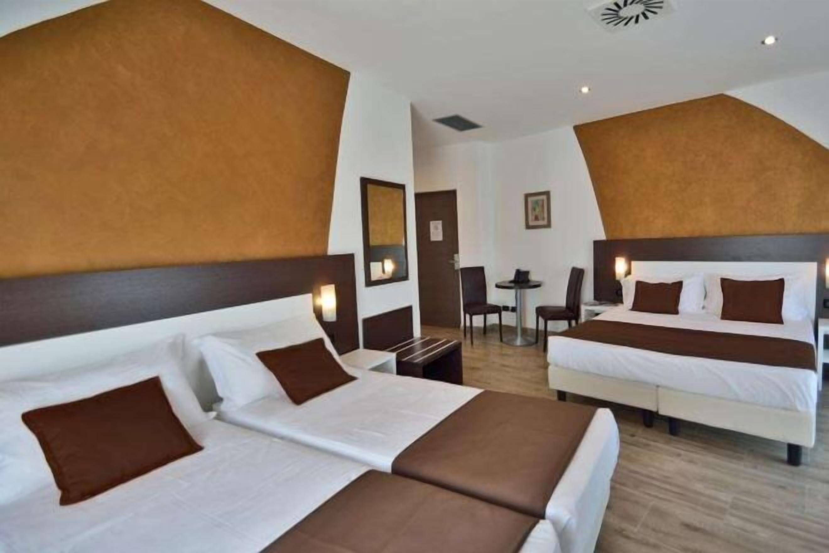 Premium bedding, down duvets, memory-foam beds, minibar