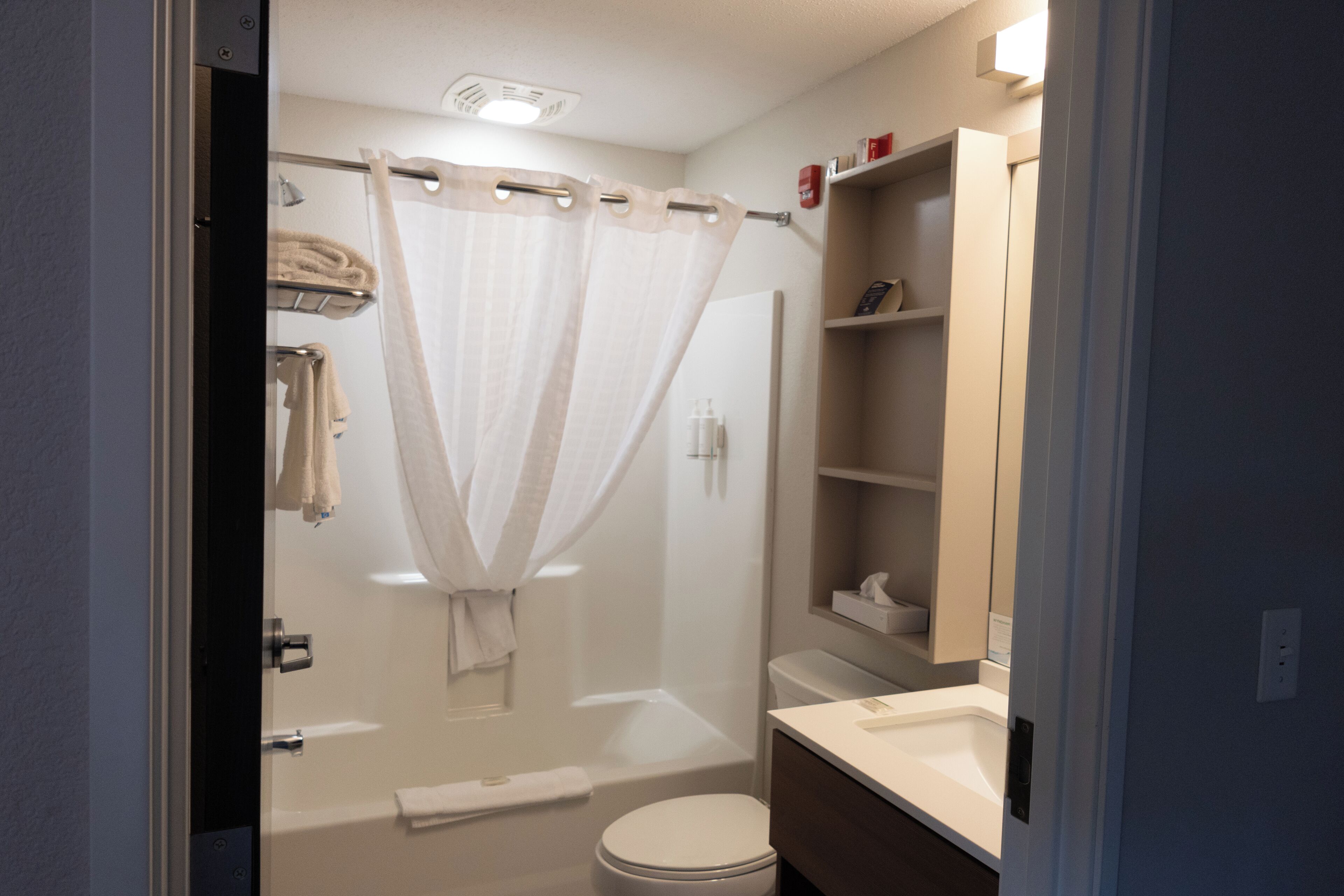 combined shower/bathtub, free toiletries, hair dryer, towels