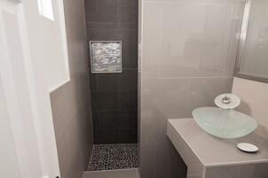 Grand Suite, 1 Bedroom | Bathroom | Combined shower/tub, hair dryer, towels