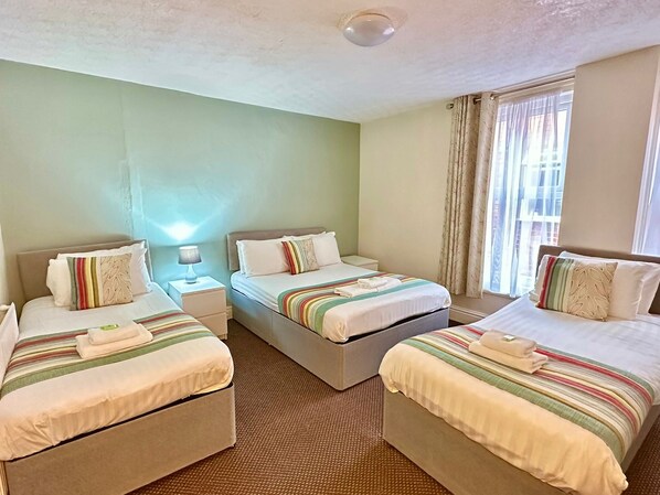 Premium Quadruple Room | Blackout drapes, bed sheets - The Georgian Hollies (Blackpool)