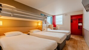 Premium bedding, desk, laptop workspace, blackout curtains