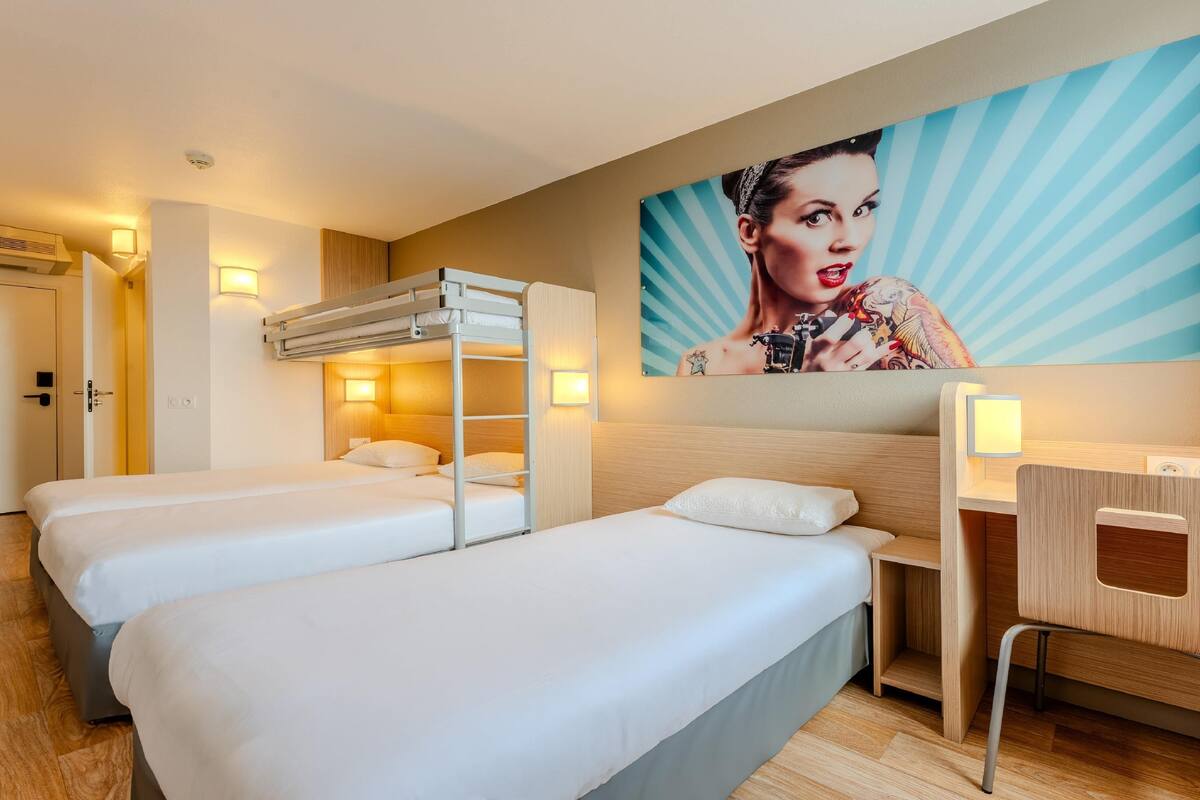 standard room, multiple beds | premium bedding, desk, laptop workspace, blackout curtains