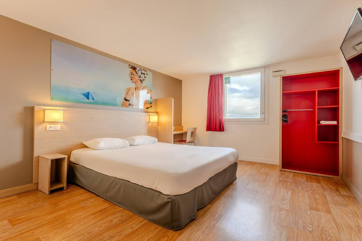 premium bedding, desk, laptop workspace, blackout curtains