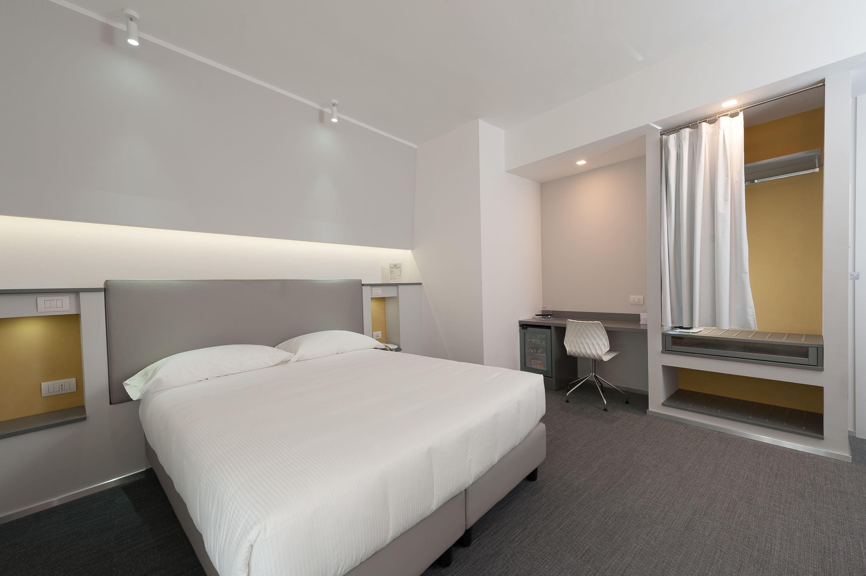 double or twin room | down duvets, minibar, in-room safe, desk