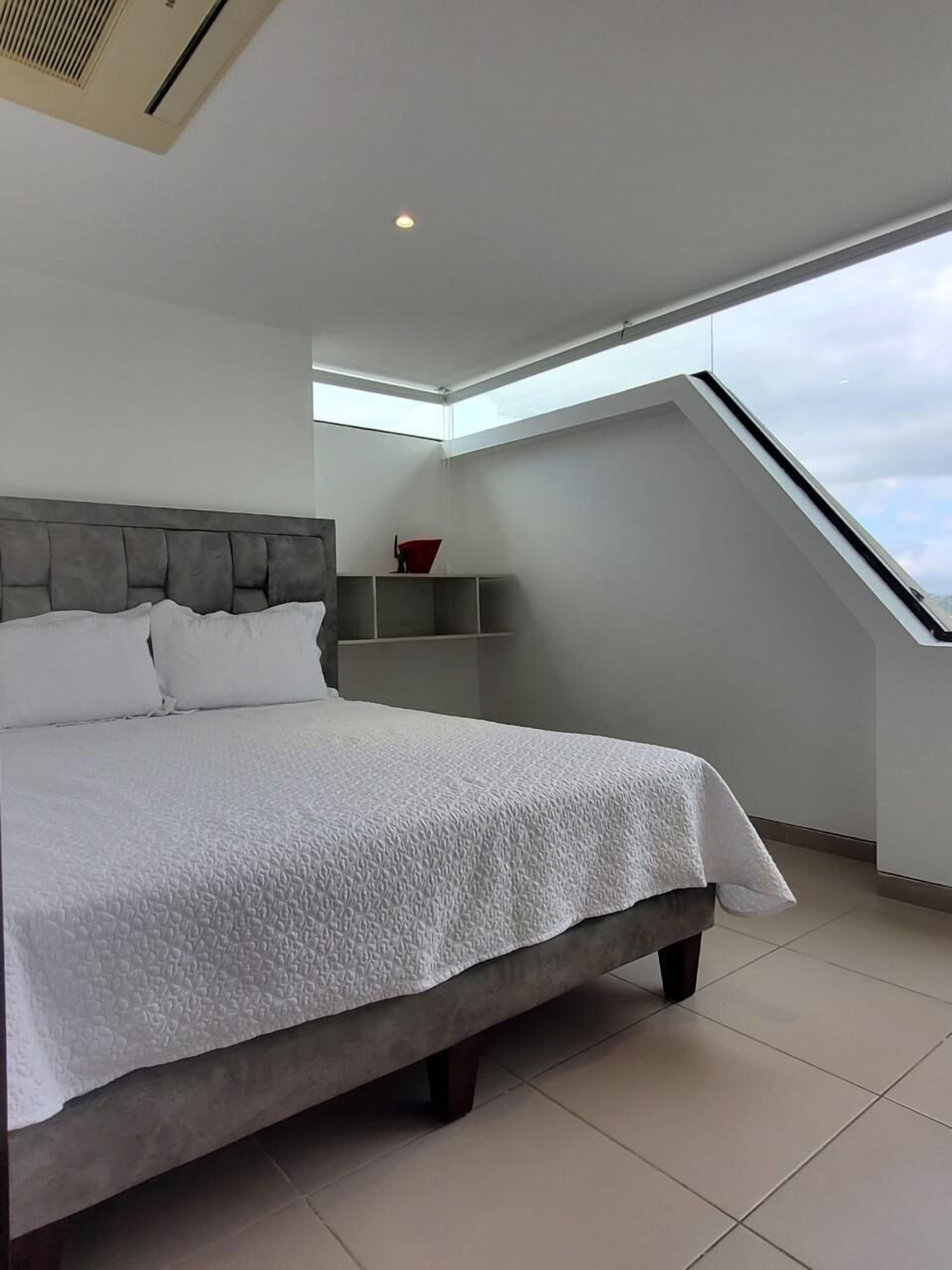 Premium bedding, down comforters, in-room safe, iron/ironing board