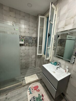 Hair dryer, towels, soap, toilet paper