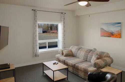 Spacious and spotless three-bedroom suite with full kitchen and livingroom.