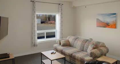 Spacious and spotless three-bedroom suite with full kitchen and livingroom.