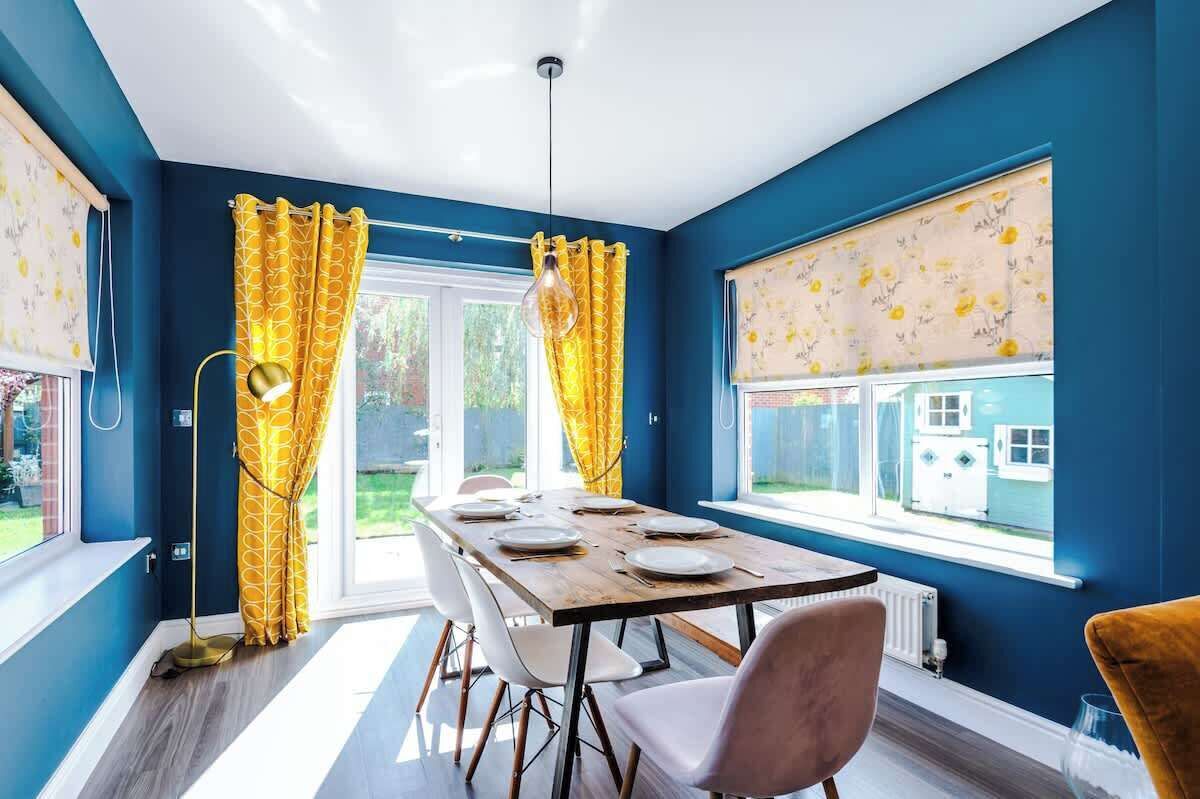 This dining room is connected to the kitchen, which is perfect for breakfast in the morning.