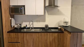 Fridge, microwave, coffee/tea maker, electric kettle