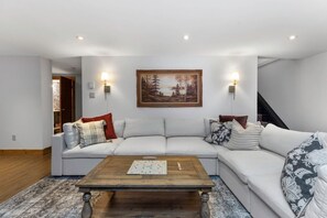 Smart TV, fireplace, table football, books