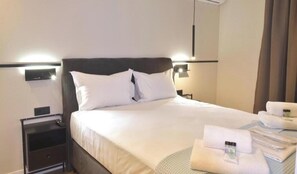 1 chambre, coffres-forts dans les chambres, fer et planche à repasser