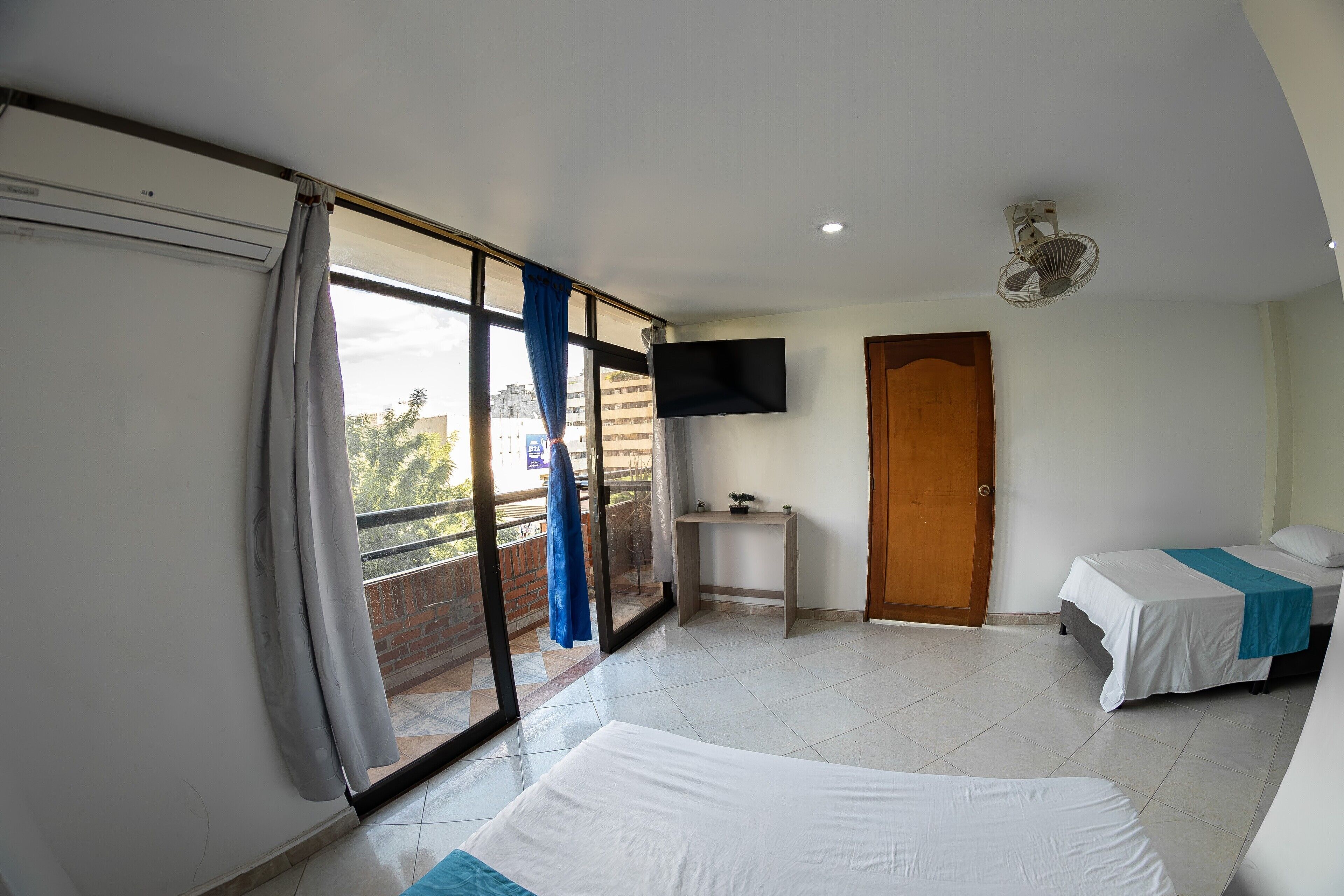 Desk, laptop workspace, free WiFi, bed sheets