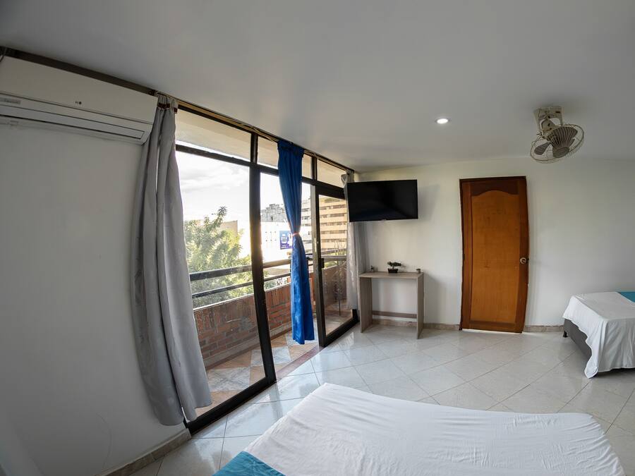 Desk, laptop workspace, free WiFi, bed sheets