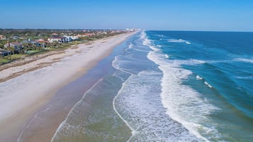 On the beach, sun loungers, beach towels