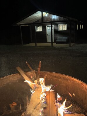 Property grounds - Adorable log cabin on back country road with peace, quiet, all amenities of home (Kimbolton)