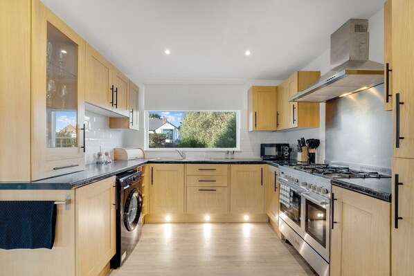 Fridge, microwave, oven, dining tables