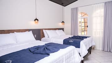 Family Room, Courtyard View | Desk, laptop workspace, free WiFi, bed sheets