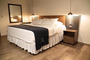 Junior Suite, Courtyard View | Desk, laptop workspace, free WiFi, bed sheets