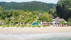 A resort with a beach, pool, and lush greenery. - Layana Resort & Spa (Koh Lanta)
