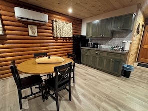 Dining - Charming log cabin on gravel back road with peace, quiet, all amenities of home (Kimbolton)