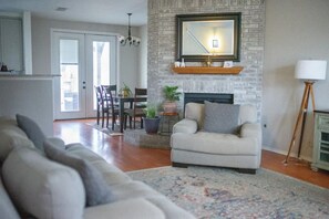 Smart TV, fireplace, books