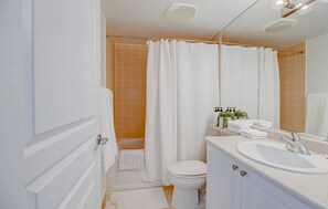 Hair dryer, towels, soap, shampoo