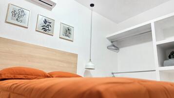 2 dormitorios, tabla de planchar con plancha, wifi y ropa de cama