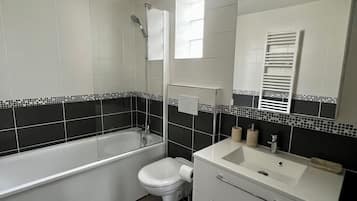 Hair dryer, towels, soap, shampoo