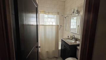 Hair dryer, towels, soap, shampoo