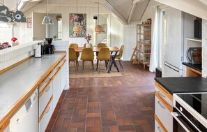 Fridge, stovetop, dishwasher, coffee/tea maker