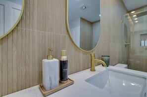 Shower, hair dryer, towels, soap