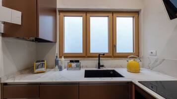 Réfrigérateur, four, plaque de cuisson, lave-vaisselle