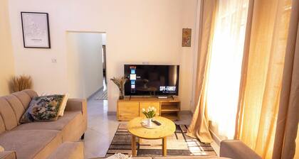 Msasani Nyumbani Apartments - 2 bedroom premium w/ AC, Washer, 60" TV + Netflix
