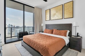 1 bedroom, desk, iron/ironing board, travel crib