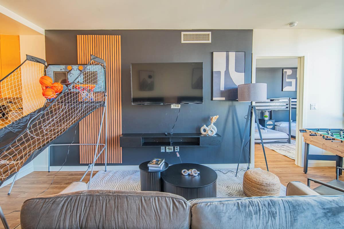 Design Apartment, 1 Bedroom, Private Bathroom | Living area | 55-inch Smart TV with digital channels