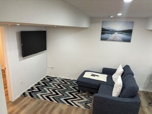 TV, computer monitors - New Basement Suite | Close to Airport | AC | Remote Work Space (Edmonton)