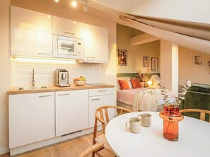 Fridge, microwave, stovetop, coffee/tea maker