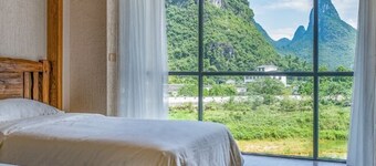 Yangshuo Riverside Shutong Inn (Impression Liusanjie Shop)