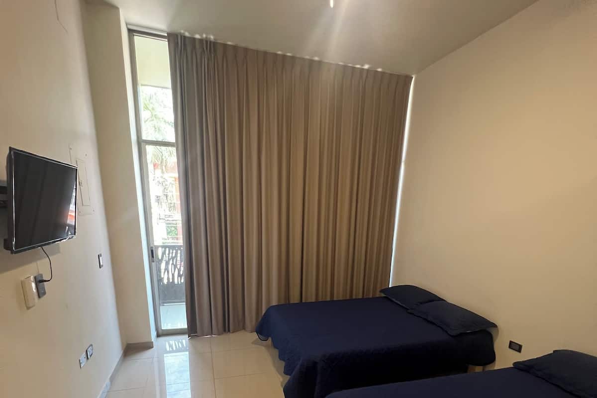 Habitación City | Wifi gratis y ropa de cama