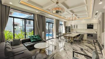Elite Villa, 6 Bedrooms, Private Pool, Courtyard View | Living room | Flat-screen TV