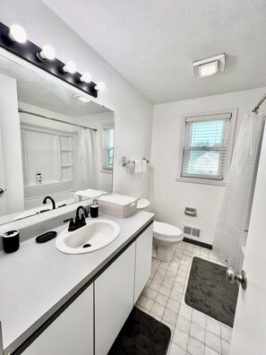 Hair dryer, towels, soap, shampoo