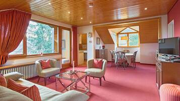 Télévision, lecteur de DVD, table de tennis de table, chaßne hi-fi